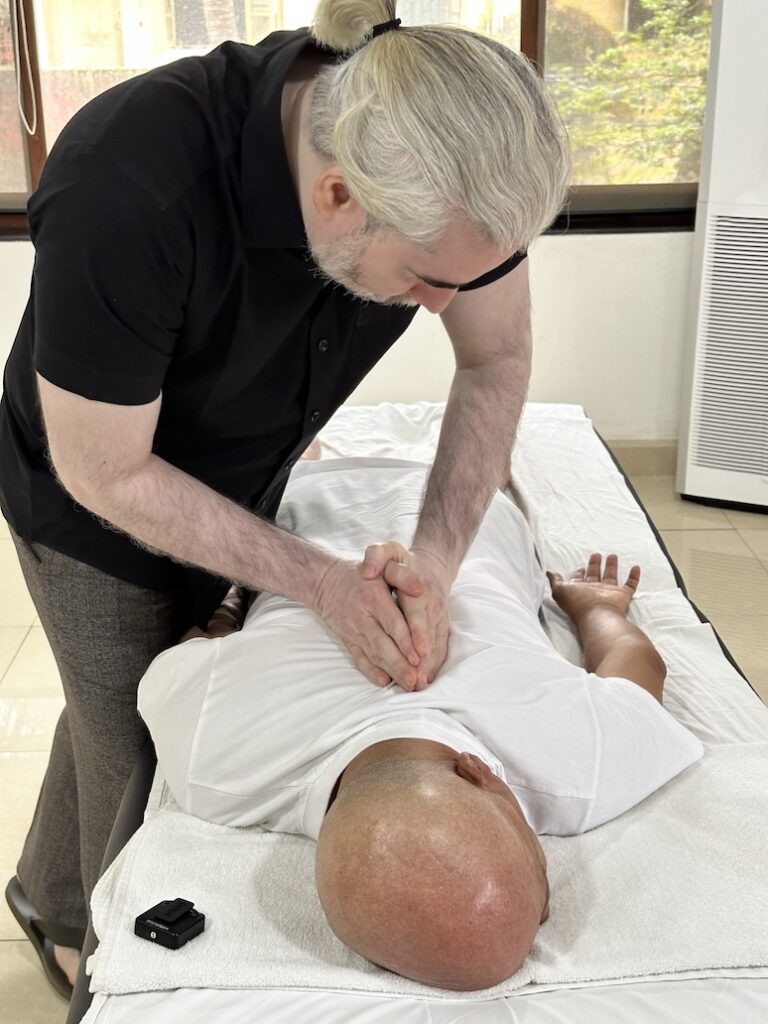 Dr Sudarshan Performing Thoracic manipulation 